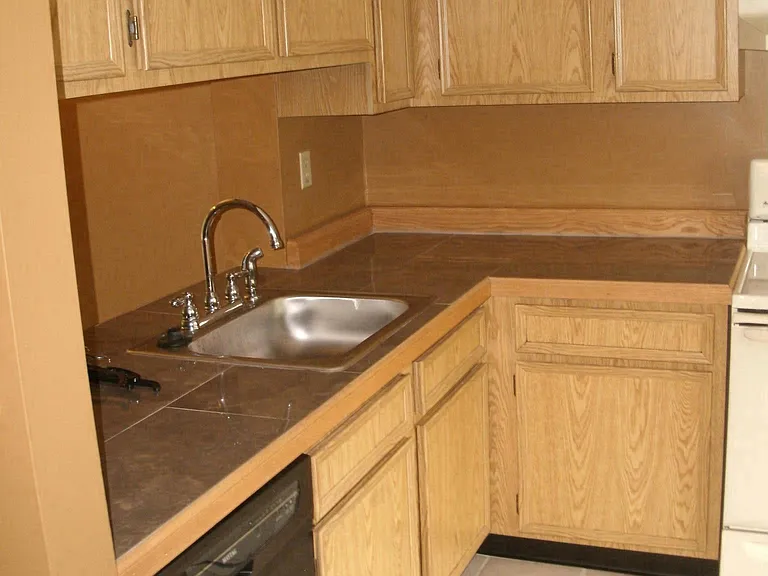 Ceramic Tile Kitchen counters, Garbage disposal, dishwasher, microwave.