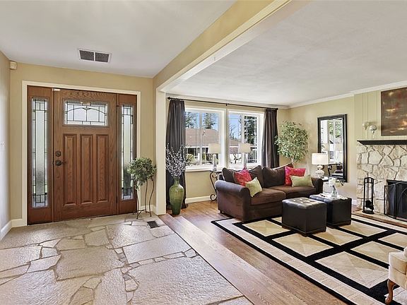 Standing in the entrance and looking back at the front door.  Every room is spacious.