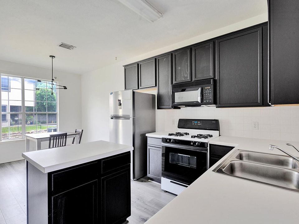 Kitchen overlooking the dining area in the back
