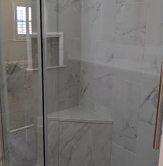 primary ensuite large walk-in shower with bench