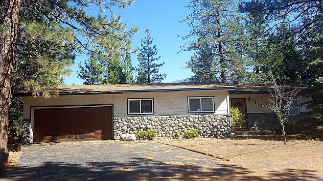 Front of house wide driveway