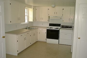 Plenty of cabinet and closet space and a new ceramic tile floor.