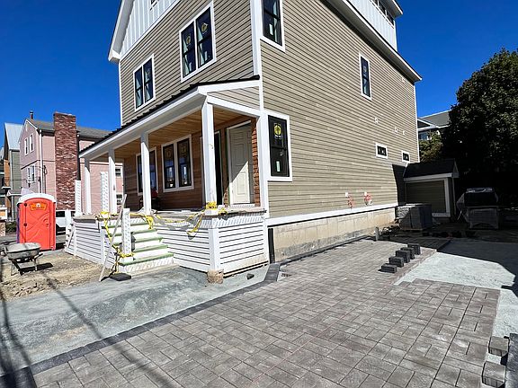 Exterior progress, Pavers being installed