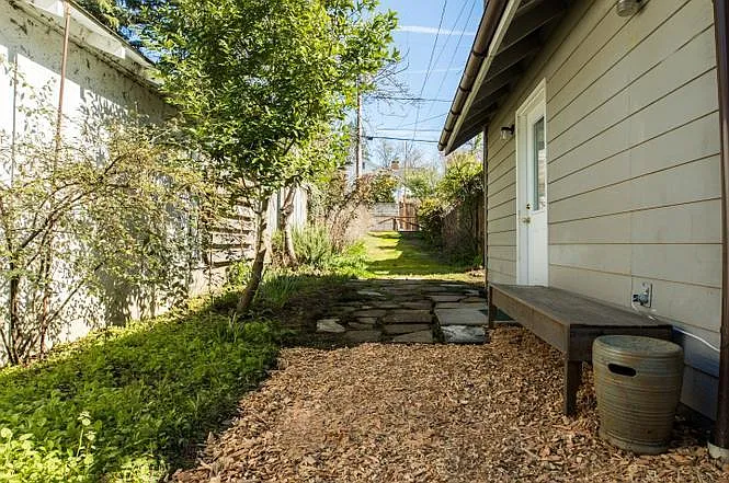 This is the driveway access to the studio. A covered parking spot has been added since this photo was taken.