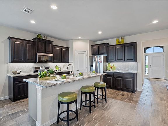 All photos shown here may not depict the specified home & features included are for illustration purposes only