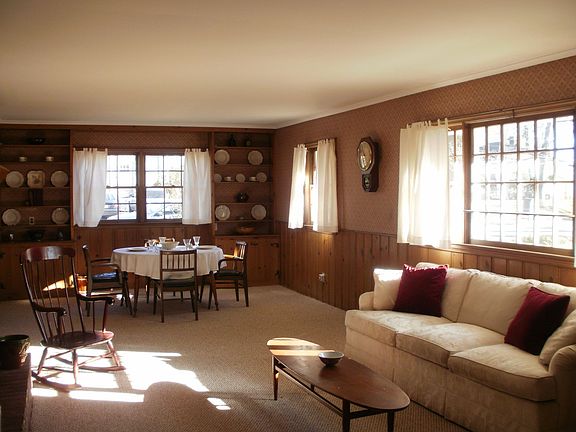 living/dining room with fireplace