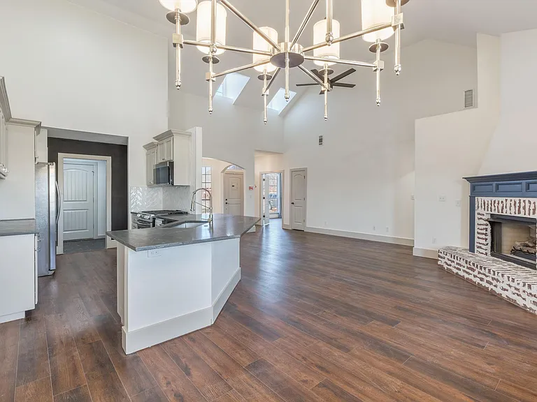 Living Room - Kitchen and Fireplace