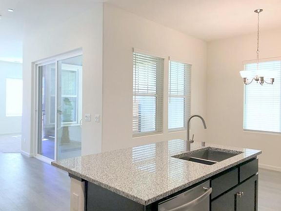 From the Kitchen....sliding glass doors to large patio.