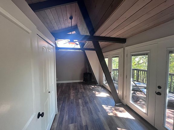 Walking into master bedroom, closets to the left