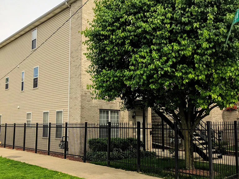 Located on the corner of a quiet, tree-lined street