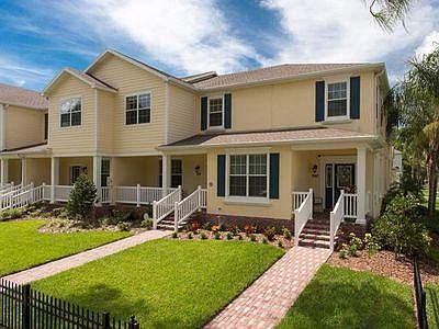 Spacious end unit offers open views, manicured landscaping, and plenty of natural light.