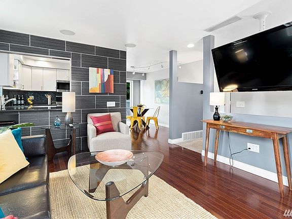 Kitchen opens to the living room making it easy for everyone to see the big game and for favorite snacks to get shared. 