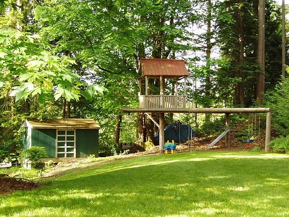Big yard with afternoon shade, shed, huge play area