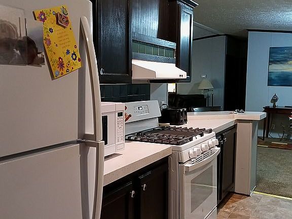 Galley kitchen with new appliances