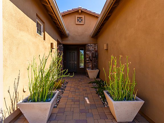 Pavers lead you to your formal entryway