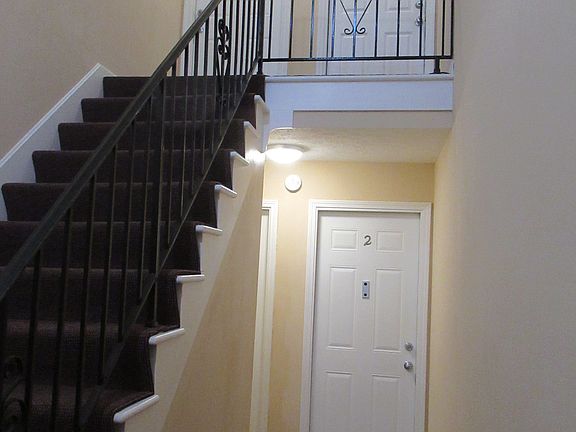 Main Lobby: 2nd Floor Fire Extinguisher on balcony at top of stairs