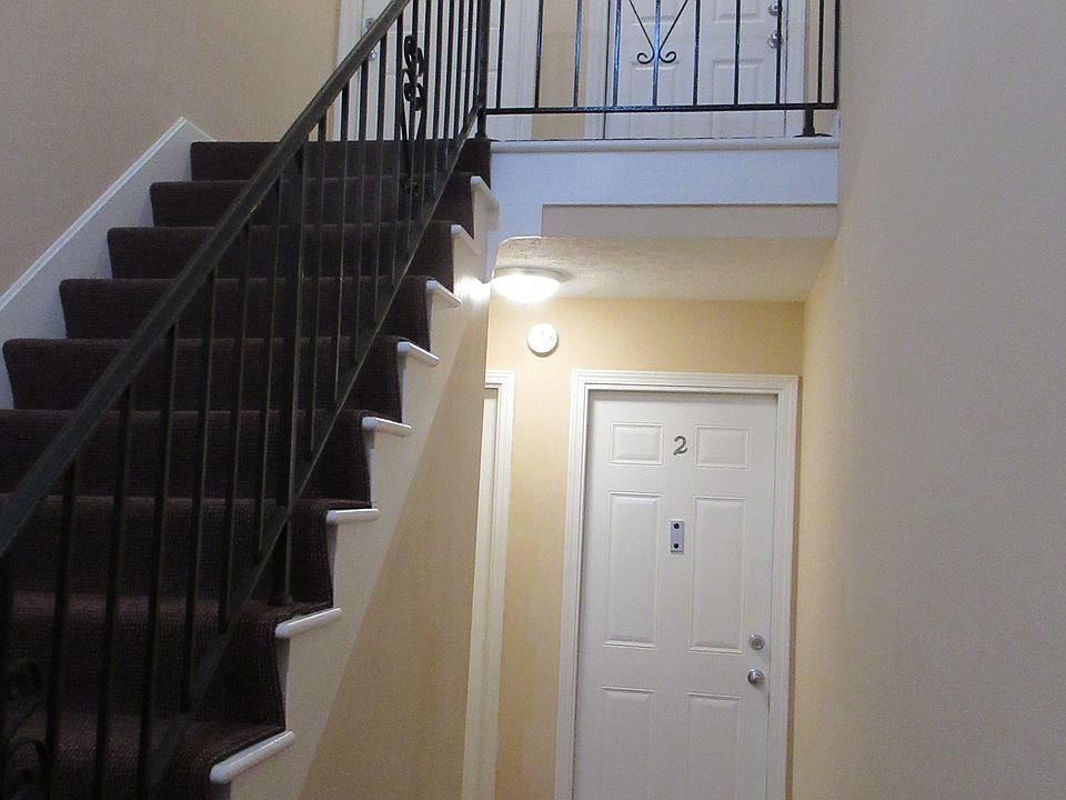 Main Lobby: 2nd Floor Fire Extinguisher on balcony at top of stairs