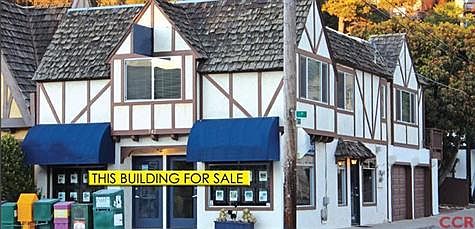 On the bustling corner of Main and Arlington on the sunny side of the street. Coveted garage to this building that enters from the side street, not the alley.