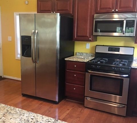 Stainless steel appliances and granite countertops
