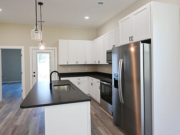 5th image of 1050 Xian Way NW