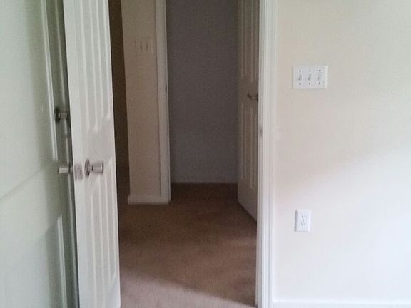 View from Bedroom #1 looking out into upstairs foyer