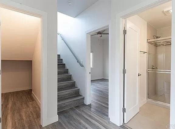 Bedroom 2, guest bath(full), and stairs/storage