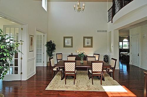 Formal dinning room with two story ceilings and a great entertainment space.