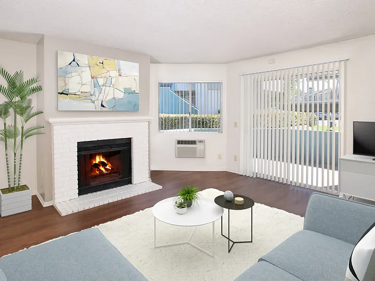 Living Room with Hard Surface Flooring, Fireplace and Balcony