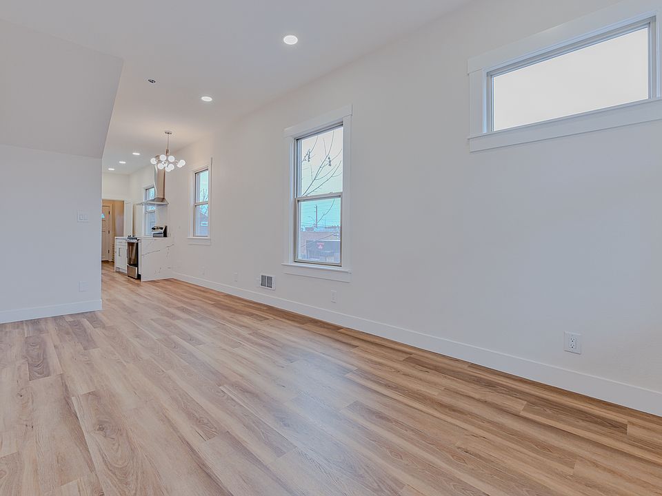 Spacious Living Area with 10 Foot Ceilings and Lots of Windows