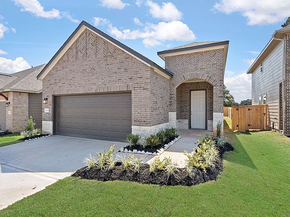 An additional view of the home and inviting entryway.
