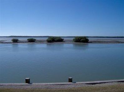 Serene birding Island in view.