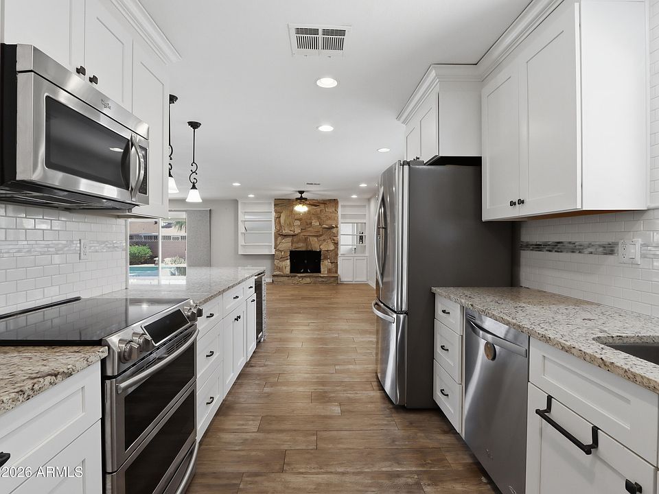 1st image of 9627 W LINDGREN Avenue