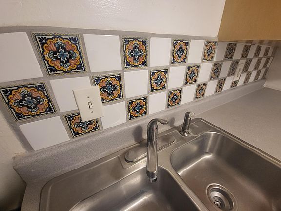 new spanish tile backsplash