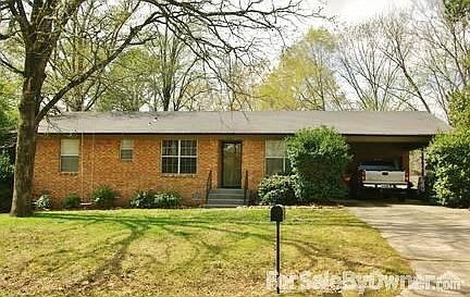 210 Hallmark St.
						:
						Nice curb appeal with mature landscaping and large trees.