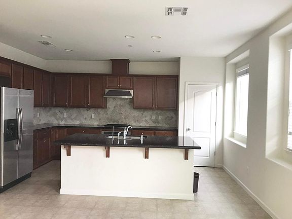 Spacious kitchen with plenty of natural lighting