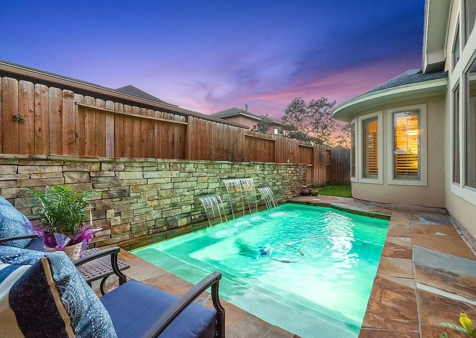 Gorgeous cocktail pool with waterfall
