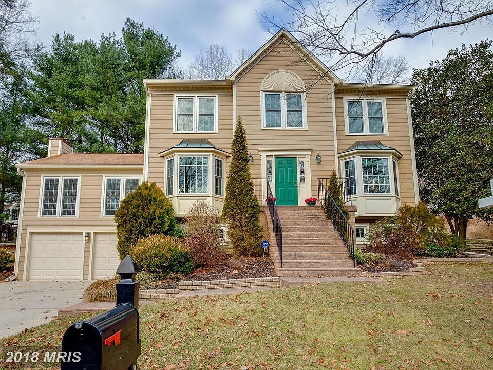 2-Car Garage & 2 Bay Windows at front