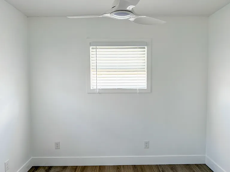 Bedroom 2 with ceiling fans