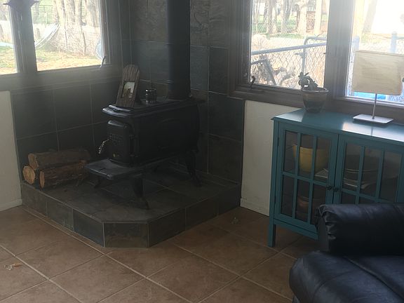 Sunroom with new wood stove