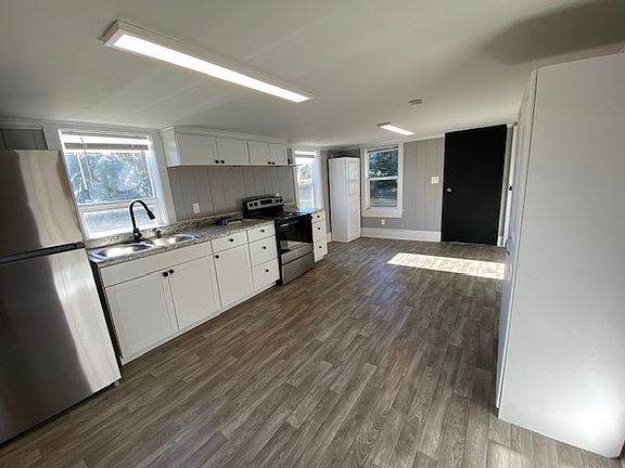New flooring, freshly painted, all new appliances, plumbing fixtures, lighting fixtures, countertop, cabinets, bath fixtures ...