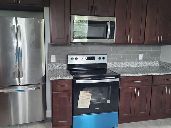 Brand new kitchen with granite counter top