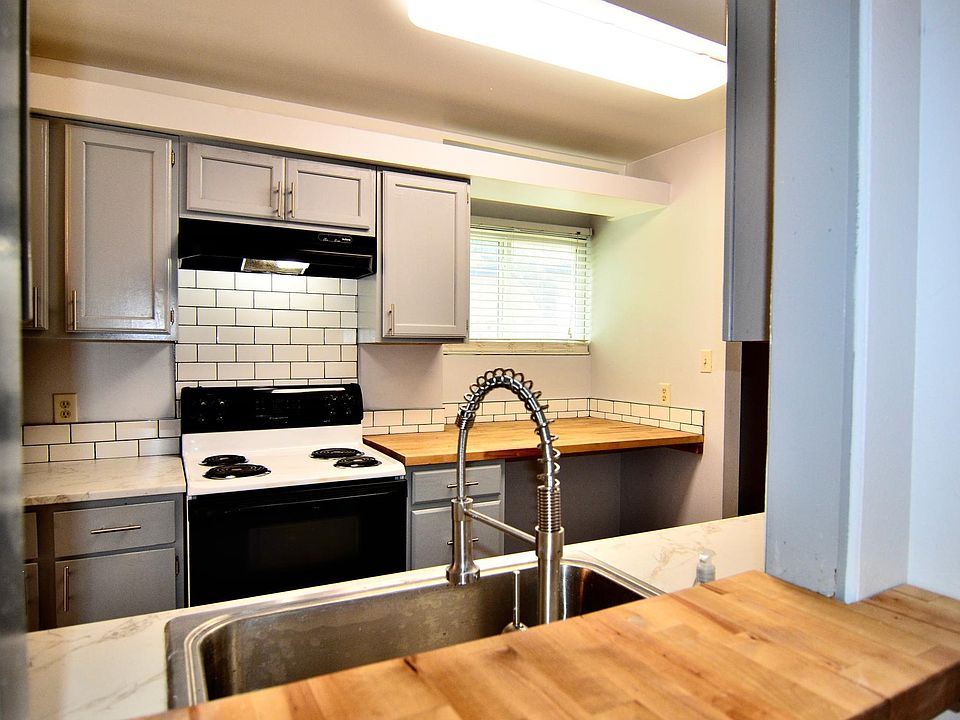 Contemporary kitchen, butcher block and new counter tops