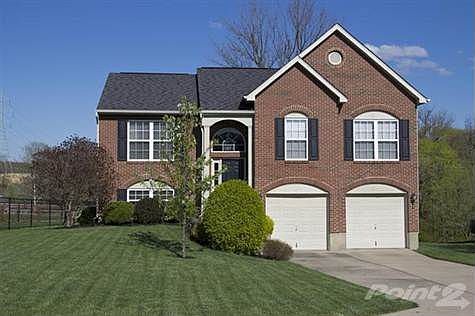 This home is located on a quiet cul-de-sac street where the neighbors are as friendly as can be. Take note of the brick exterior with arched garage doors & windows trimmed in brick soldiering. A covered front porch is flanked by box columns that lead to an arched opening. The double gabled roofline and lush landscaping add to the fantastic curb appeal this home offers.The yard has been meticulously maintained with the grass looking like a golf course, perennials, trees and shrubs that have been taken care of with extreme. This home is amazing set up a showing today to see for yourself!
