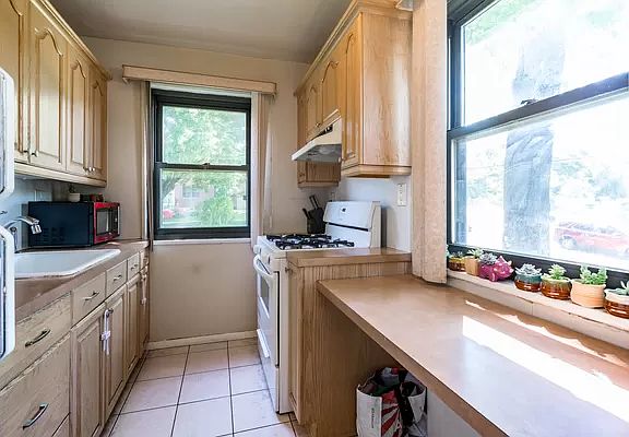 5th image of 242-39 61st Ave Floor 1