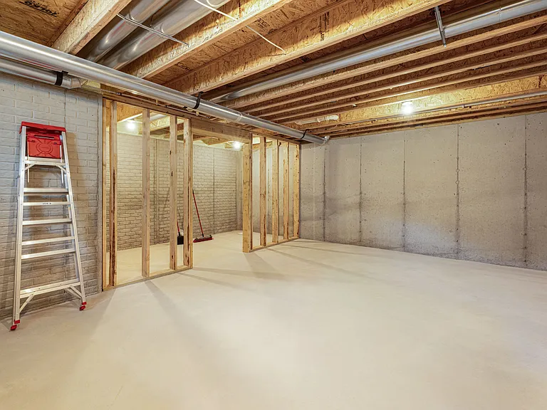 Basement - Finishing touches still in progress! Great additional storage throughout.