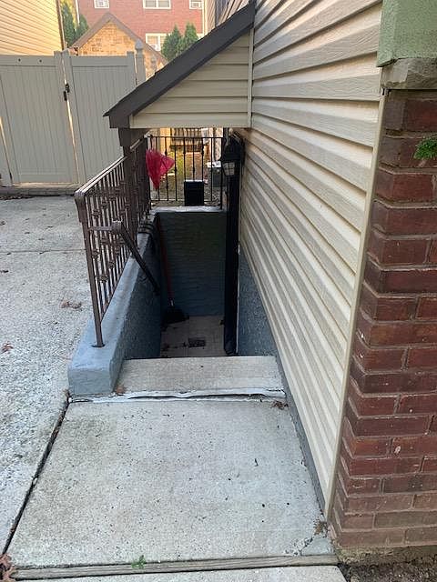 8 steps down to a basement apartment