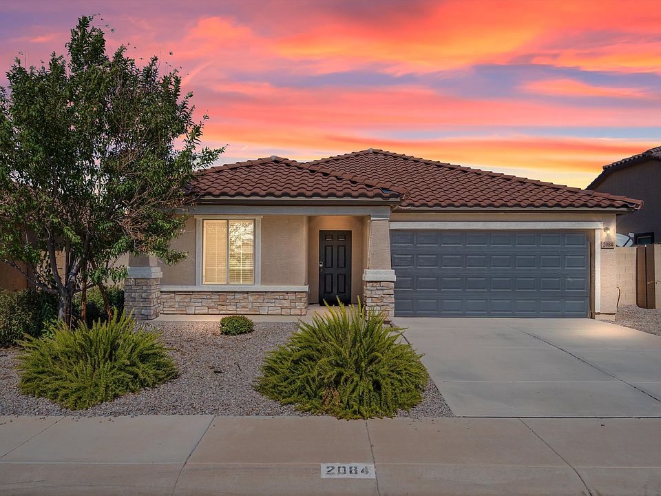 Smartly landscaped front with porch. Digital Lock for keyless entry. 2 car garage.