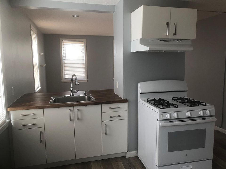 Kitchen looking into living room