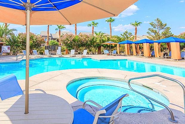 well kept main pool with spa