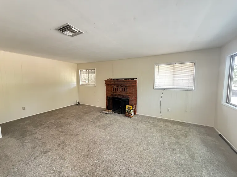 Living room with fireplace.